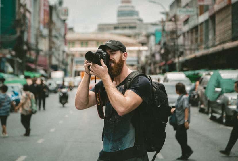 Street photographer capturing travel images worthy of editorial canvas prints
